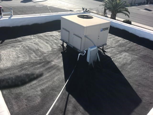 hvac unit on top of a flat roof