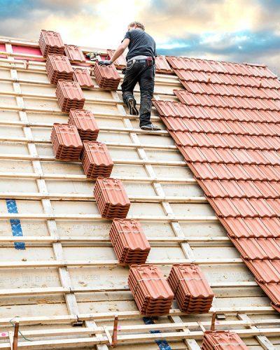 Tile Roof Repair in Las Vegas: roofing contractor installing a tile roof